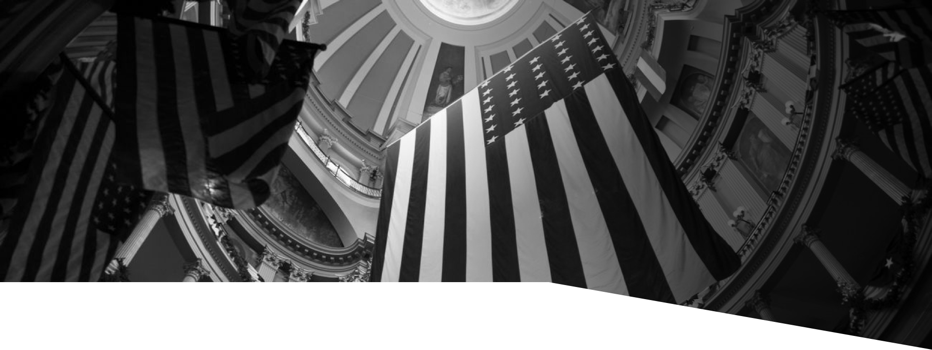 United States flag hanging from the Capitol dome inside the building