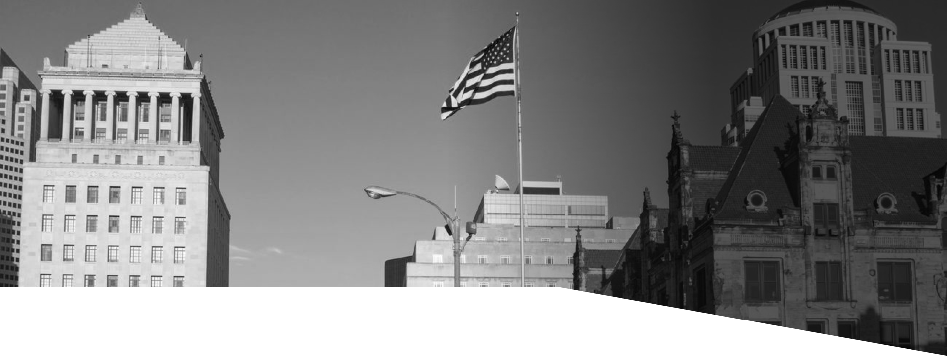 US Flag on a flagpole waving in the wind